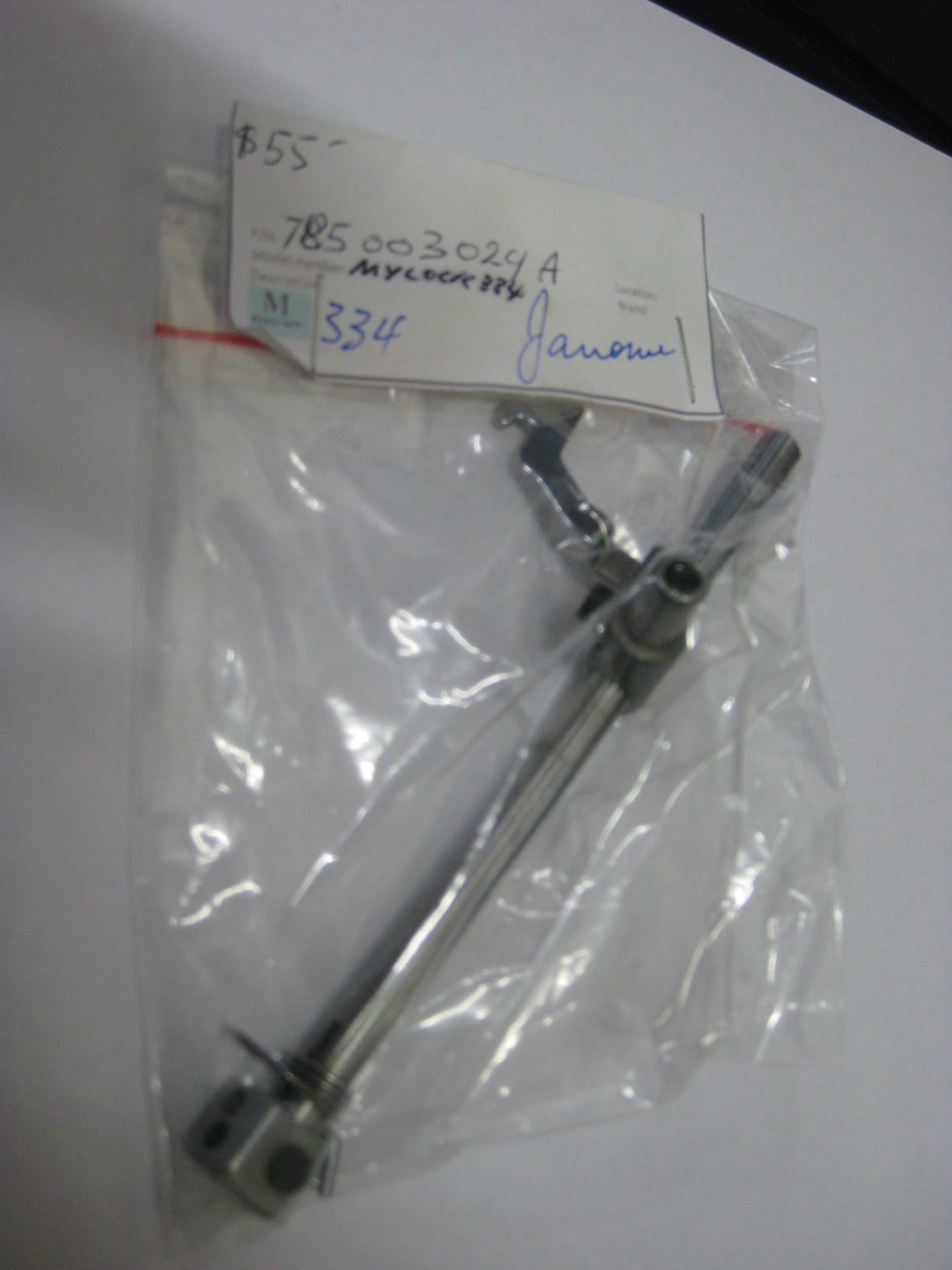785003029A NEEDLE BAR WITH NEEDLE CLAM UNIT. JANOME 334