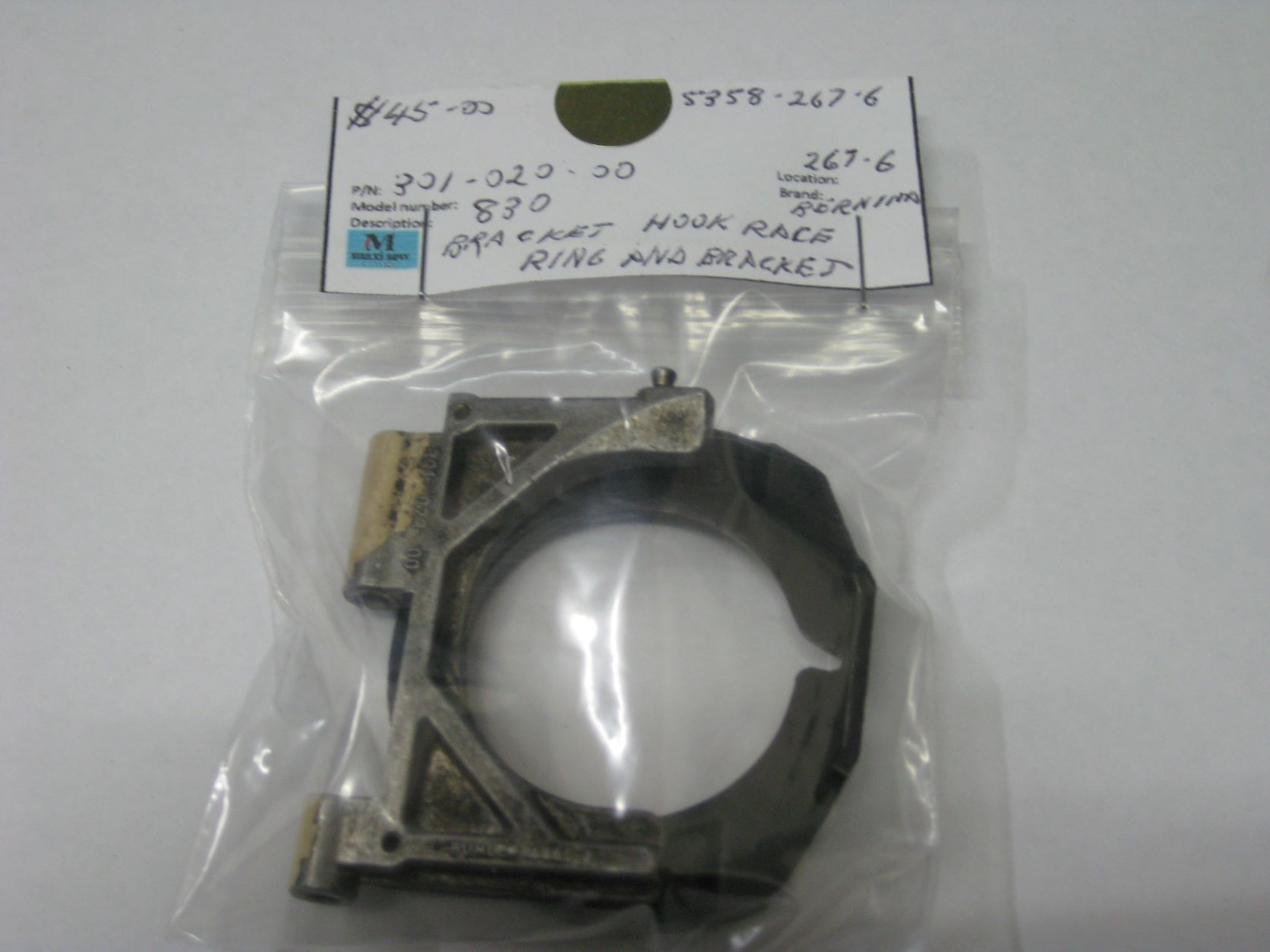 301-020-00 bracket hook race ring and bracket. Bernina 830